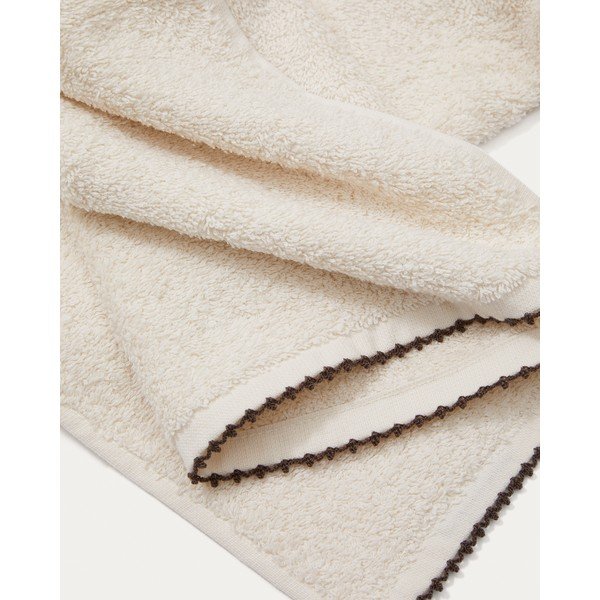 Bézs frottír pamut fürdőlepedő 90x150 cm Sinami – Kave Home-image-1