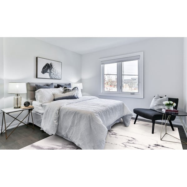 Krémszínű gyapjú szőnyeg 133x180 cm Volakas – Agnella-image-1