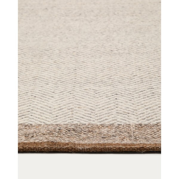 Bézs kétoldalas kézi szövésű gyapjú szőnyeg 200x300 cm Nifelia – Kave Home-image-2