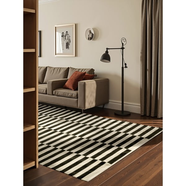 Fekete-fehér kétoldalas kézi szövésű gyapjú szőnyeg 200x300 cm Donna – Hanse Home-image-1