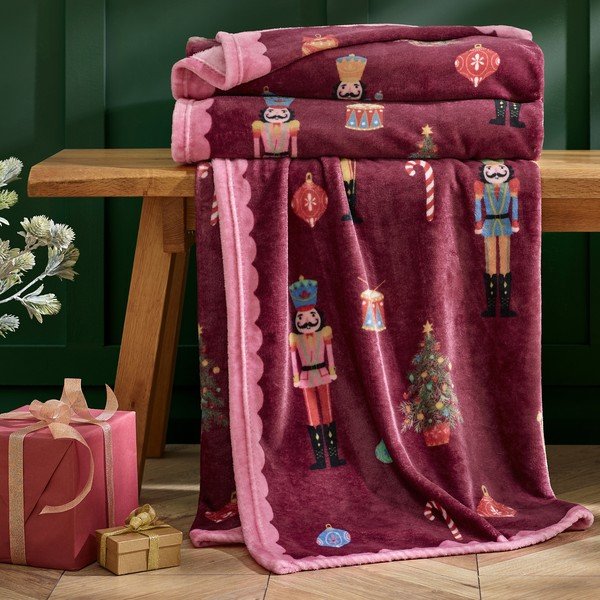 Borvörös-rózsaszín takaró karácsonyi mintával 170x130 cm Christmas Nutcracker – Catherine Lansfield-image-1