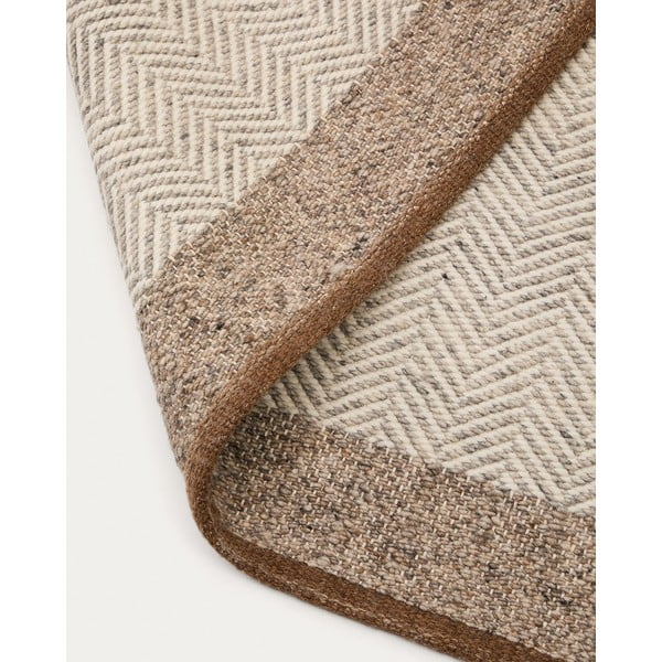 Bézs kétoldalas kézi szövésű gyapjú szőnyeg 200x300 cm Nifelia – Kave Home-image-1