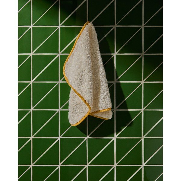 Sárga-fehér frottír pamut törölköző 30x50 cm Sedora – Kave Home-image-1