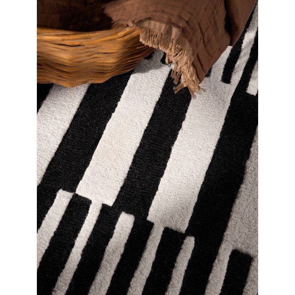 Fekete-fehér kézi szövésű gyapjú szőnyeg 120x180 cm Stryve Pulse – Elle Decoration-image-3